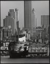 S.S. Normandie and Rockefeller Center seen from Weehawken, N.J.