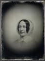 [Reproduction of a painting of a woman]