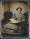 [Woman with book of music]