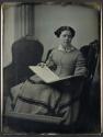 [Woman with book of music]