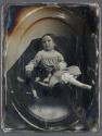 [Child with dog]