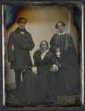 [Man and two women]