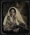 [Woman in veil]