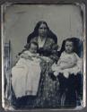 [Woman and two children]