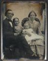 [Man, woman, and two children]