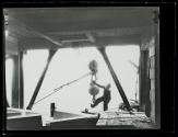 [Worker with hoisting ball]