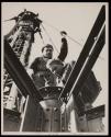 [Men working on mooring mast, Empire State Building]