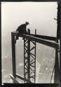 [Man on girders, mooring mast, Empire State Building]