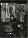 [Man on girders, mooring mast, Empire State Building]