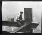 [Worker on girder, Empire State Building construction]