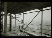 [Erecting safety barrier, Empire State Building construction]