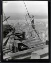 [Worker on cable, Empire State Building construction]