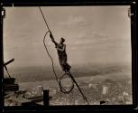 [Worker on cable, Empire State Building construction]