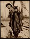 [Man with rope and pulley, Empire State Building construction]