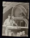 [Carpenter with band saw, Empire State Building construction]