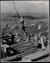 [Worker on cable, Empire State Building construction]