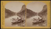 [Photographer with boats and equipment]