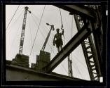 [Worker on girder, Empire State Building construction]