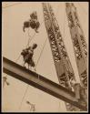 [Worker on girder, Empire State Building construction]