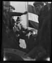 [Workers with flag, mooring mast, Empire State Building]