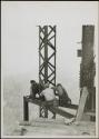 [Men finishing the mooring mast and tower, Empire State Building]