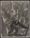 [Man on girders, mooring mast, Empire State Building]
