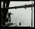 [Man on girders, mooring mast, Empire State  Building]