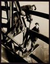 [Riveters working on mooring mast, Empire State Building]