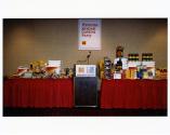 Banquet table filled with sports goods, Kodak CoSIDA Party