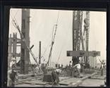 [Derricks, Empire State building construction]