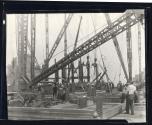[Derricks, Empire State building construction]