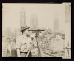 [Engineer with surveyors level, Empire State building]