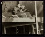 [Man with cutting torch, Empire State Building]
