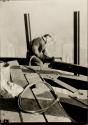 [Man with cutting torch, Empire State Building]