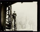 [Man with cutting torch on girders, Empire State Building]