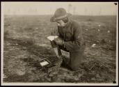 [Soldier with telegraph set, Army training camp]
