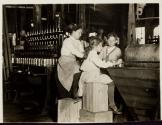 Daisy - 8 yrs old working at capping machine in Del. cannery. Caps...