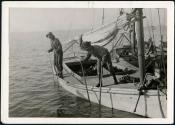Fred, a small oyster fisher, working on a oyster boat in Mobile Bay,..
