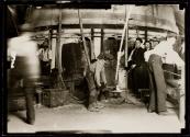Young boy in glass factory