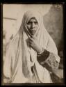 [Woman holding veil at neck, Salonika, Greece]