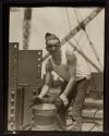 [Worker with bucket, Empire State Building]