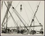 [Derricks, Empire State building construction]