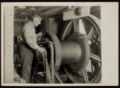 Hoisting engineer on Empire State Building, N.Y. City