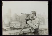 [Engineer with surveyors level, Empire State building]