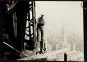 [Man with cutting torch on girders, Empire State Building]