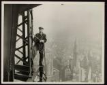 [Man with cutting torch on girders, Empire State Building]