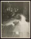 [Man using cutting torch, Empire State Building]