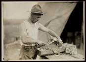 [Soldier cutting meat, Army training camp]