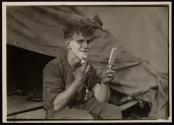 [Soldier shaving, Army training camp]