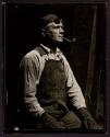 [Worker with goggles and a pipe, Empire State Building]